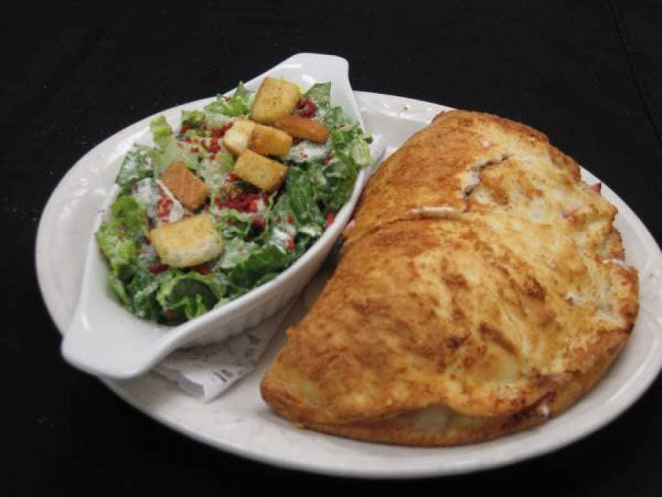 Stromboli with a side Caesar salad