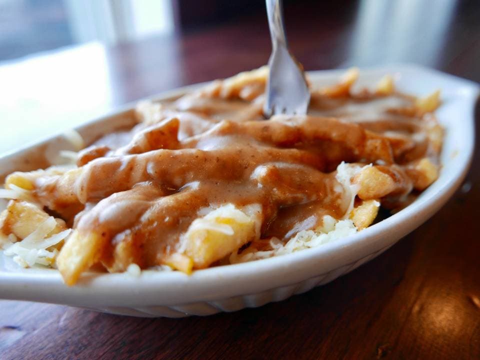 Poutine with gravy and cheese curds